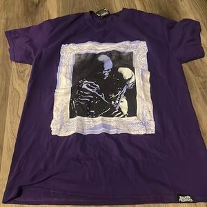 Purple broken promises shirt, size medium, good condition, barley worn.